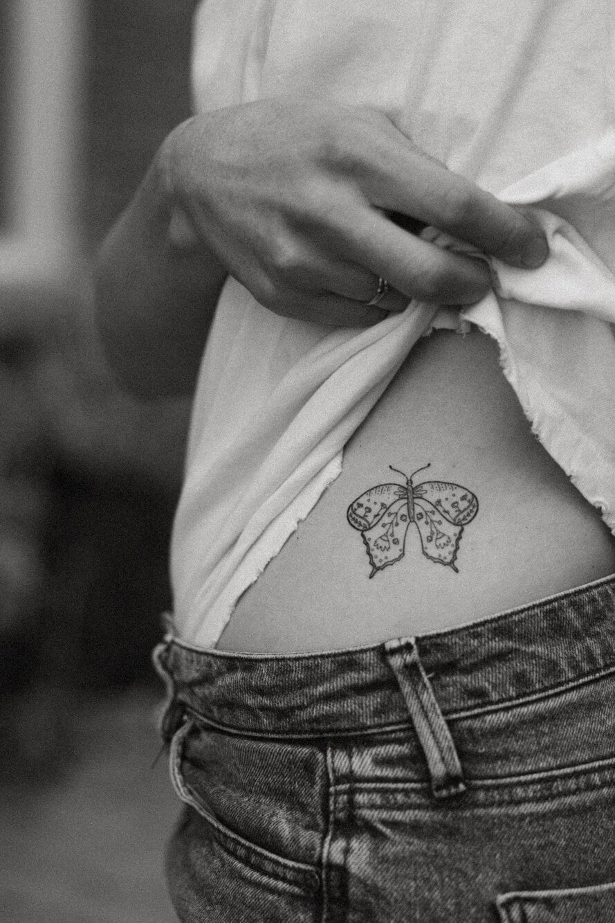 Saint & Company butterfly sun and moon tattoo