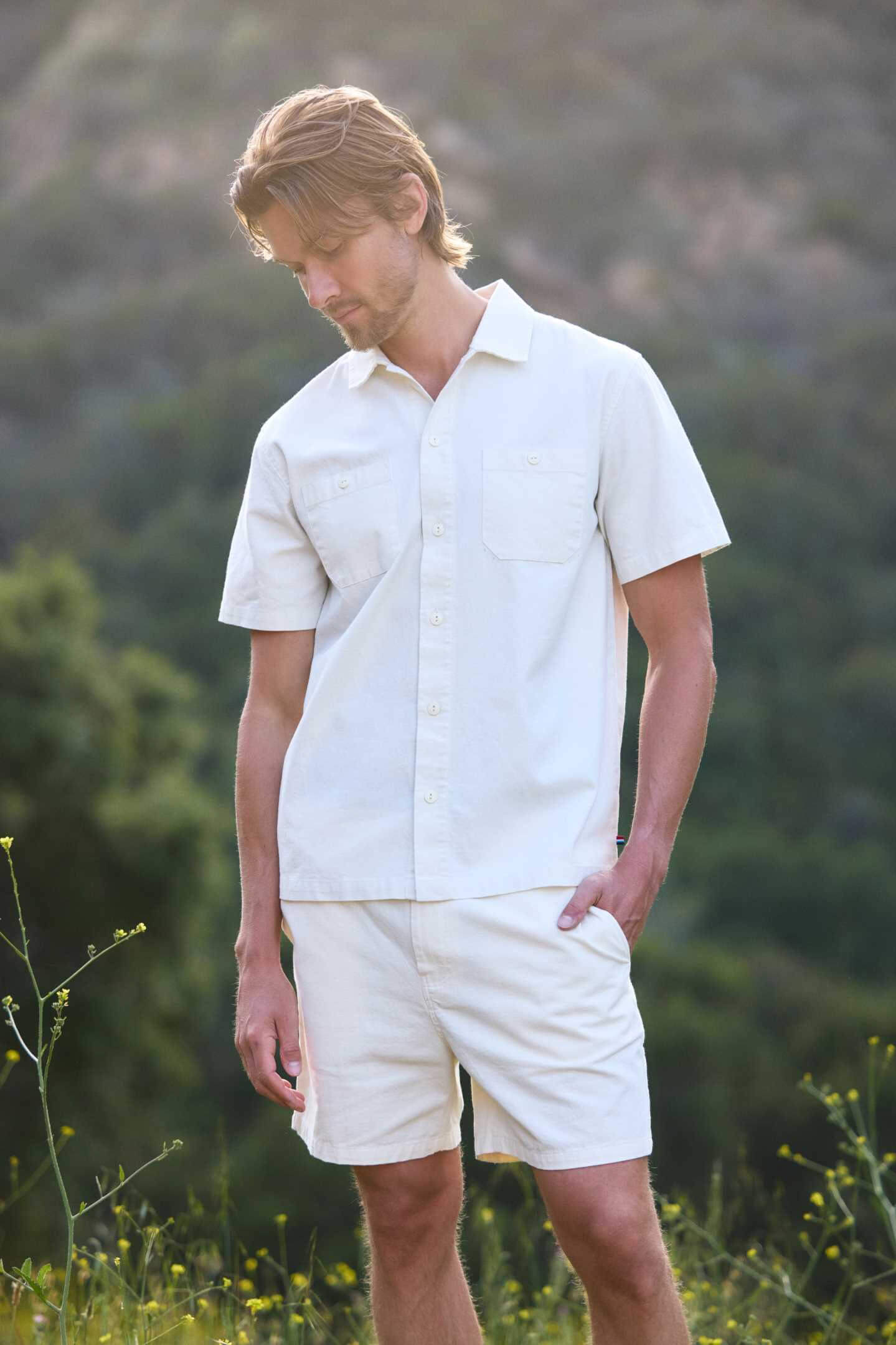 Sol Angeles Holloway short sleeve shirt in ecru. Sol Angeles men’s clothing. Casual men’s clothing. Upscale men’s clothing. Weekend clothing for men. Vacation clothing for men. Casual chic clothing for men. Men’s vacation clothing. Men’s weekend wear clothing. Linen clothing for men. Comfortable cotton clothing for men. Breathable clothing for men. Transition clothing for men. Casual button down shirts for men. Comfortable men's shirts.