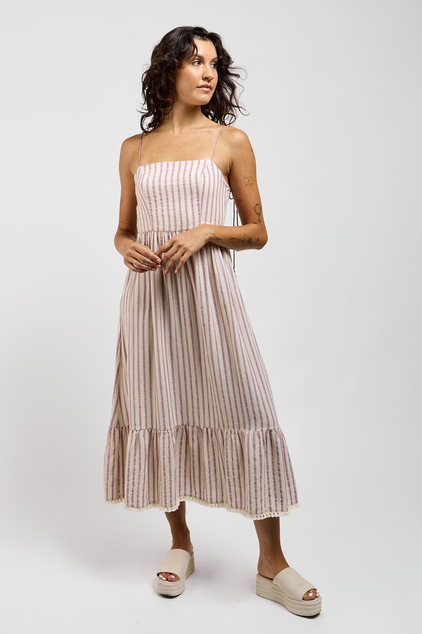 Womens dress with tassels at bottom hem and thin rope straps