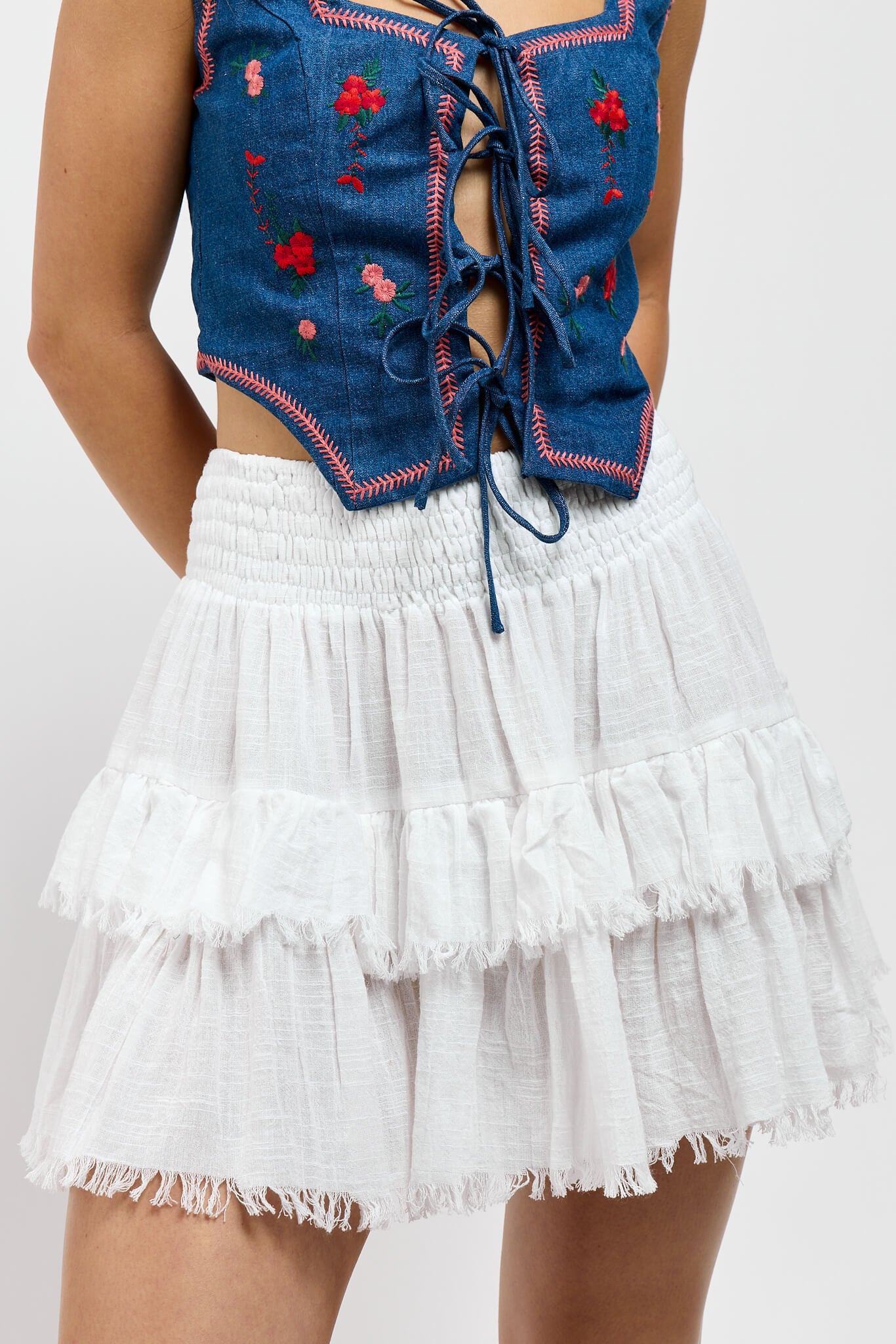 Womens tiered raw edge mini skirt