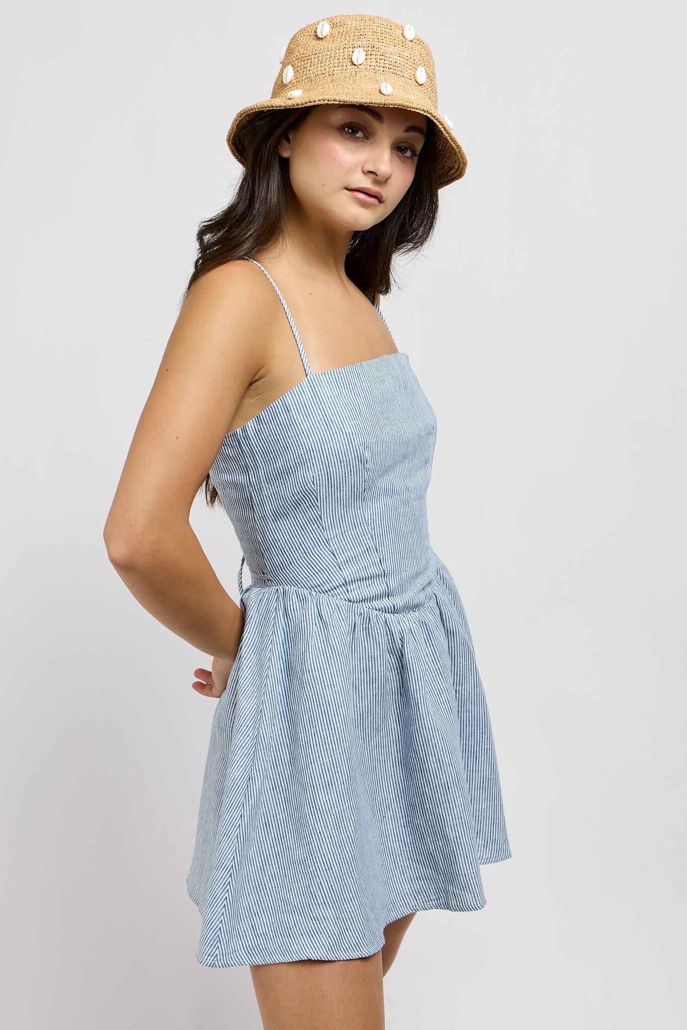 Womens blue and white striped mini dress with adjustable spaghetti straps.