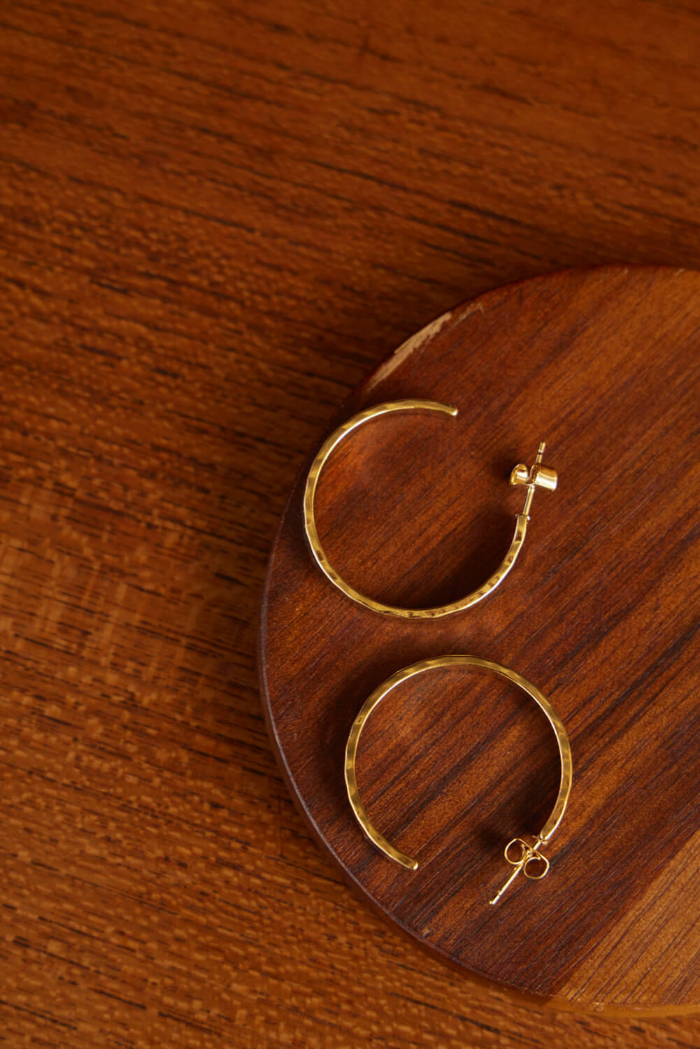 Women's semi hoop gold earrings