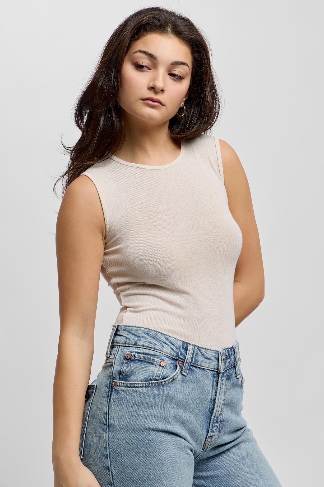 Womens ecru colored sleeveless soft bodysuit