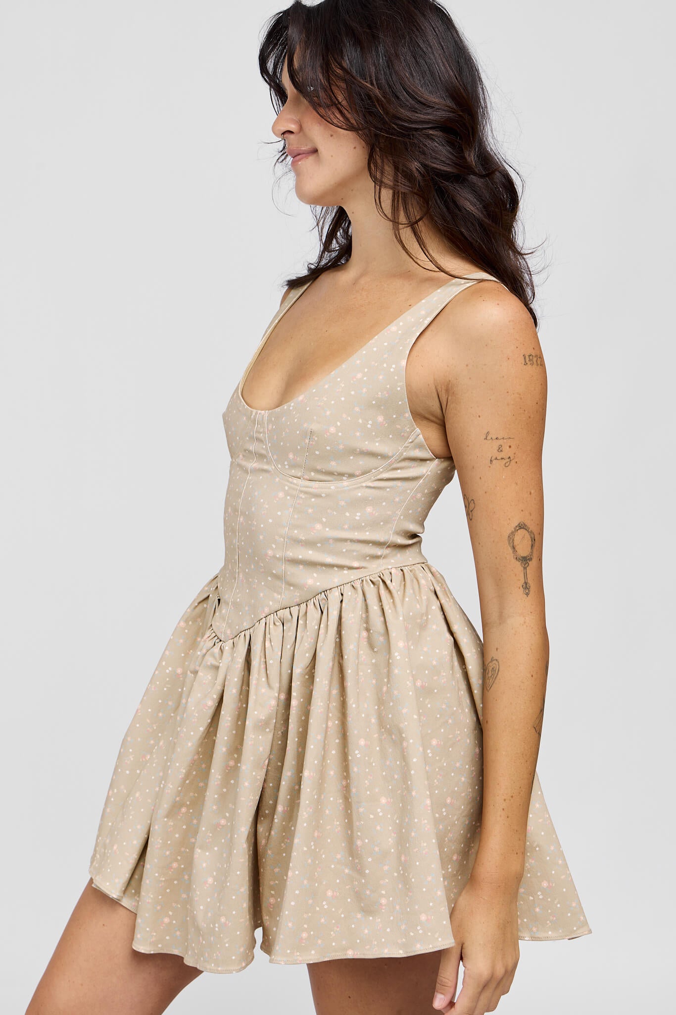 Womens beige dress with dainty floral print all over