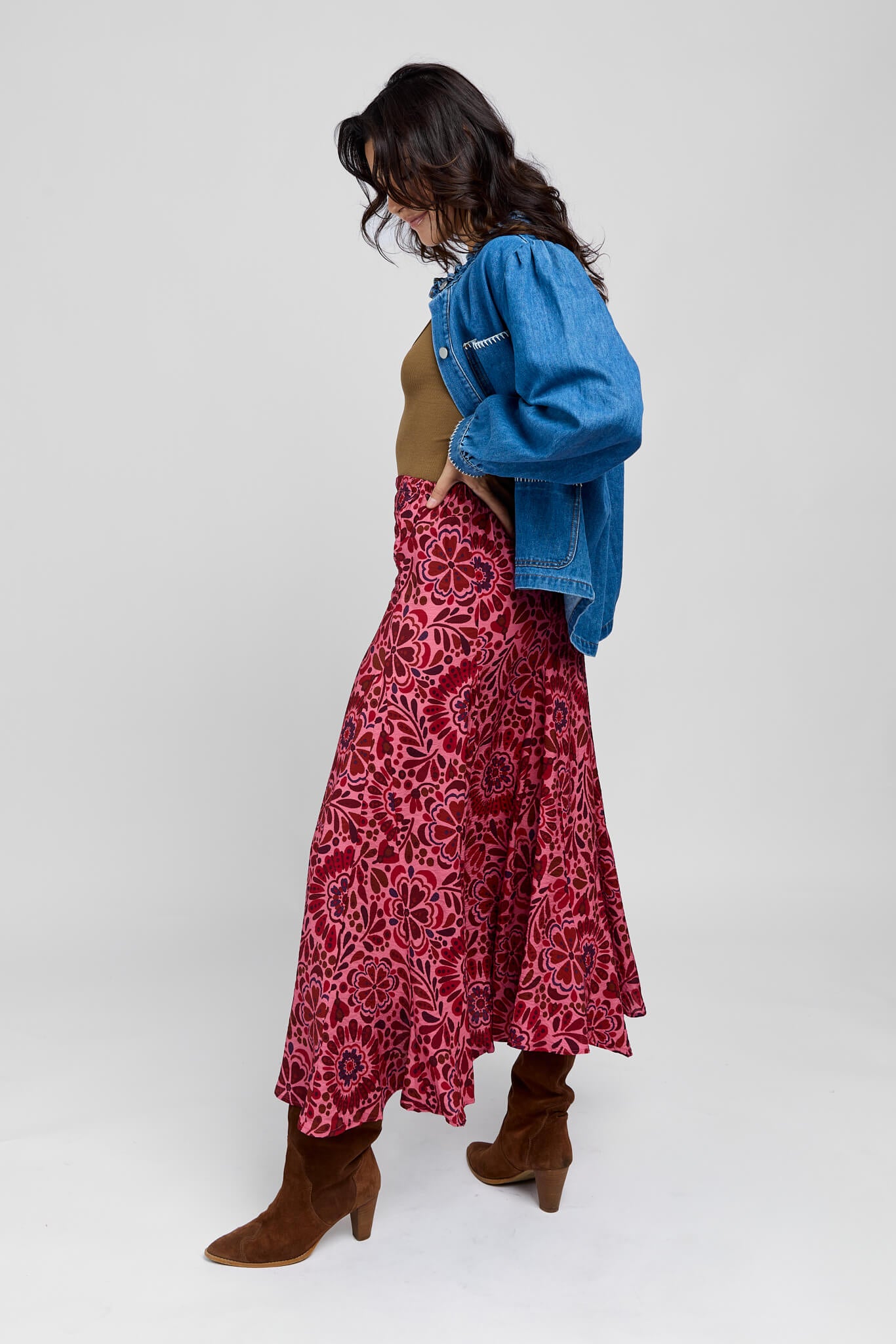 Womens pink midi skirt with red print throughout