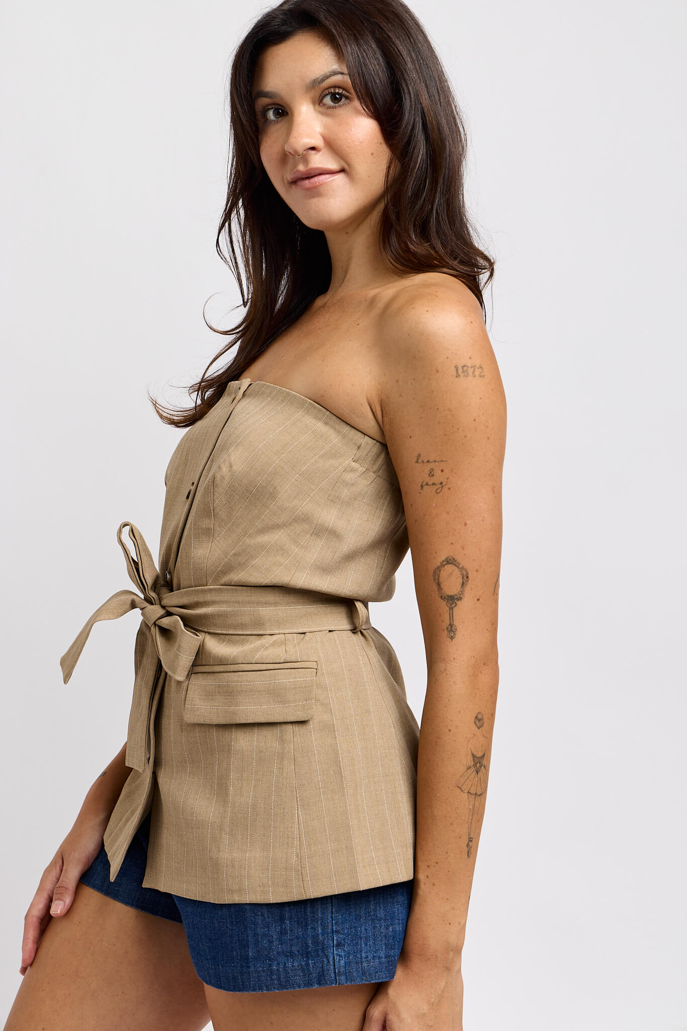 Womens brown tube top with waist and sleek pinstripe details