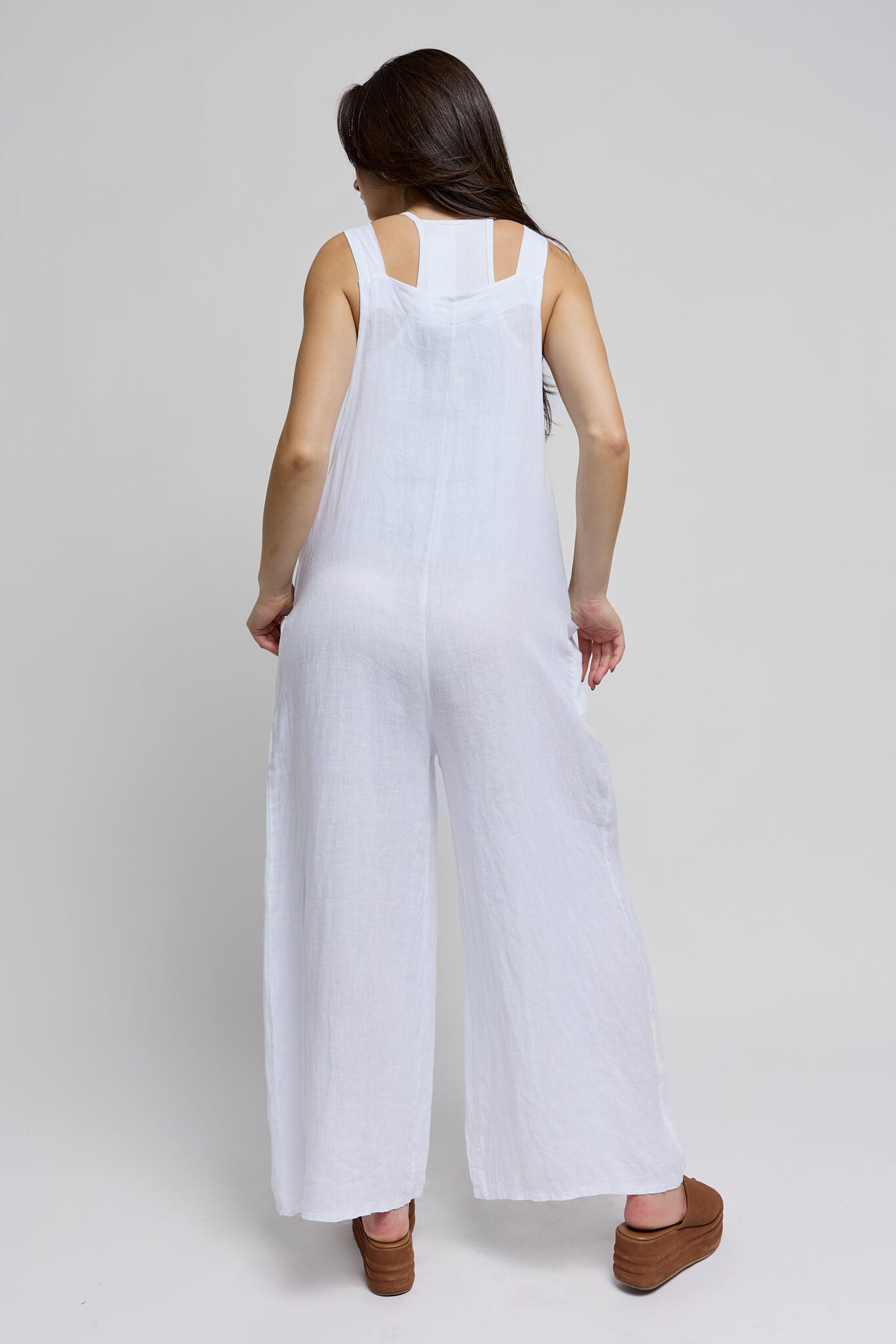 Womens white overalls with side pockets and wide leg pant