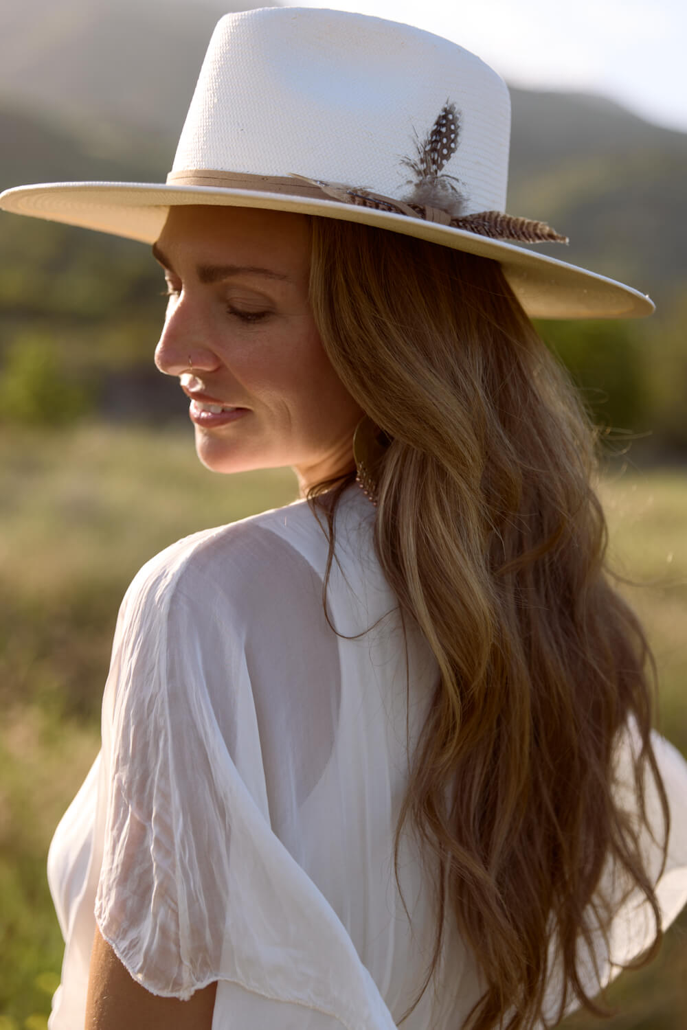 Straw hat with adjustable headband